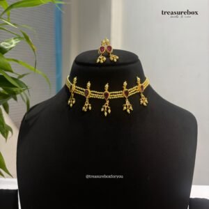 Golden badampeti with matching earrings